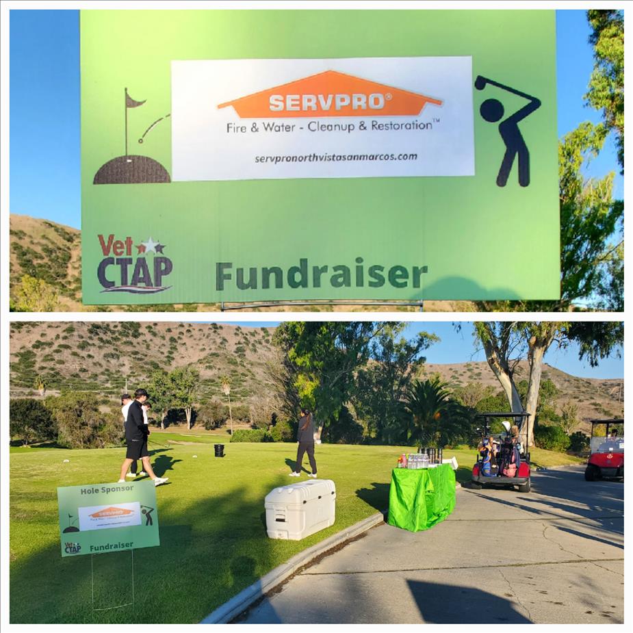 A group of VetCTAP golfers in action, raising funds for veterans, beside a SERVPRO® fundraiser sign.