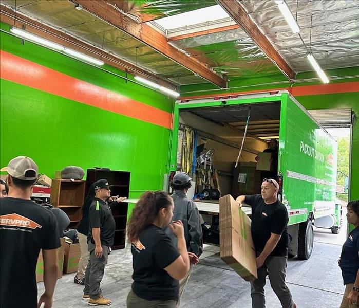 Our Contents Team working hard to move to our new warehouse!